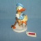 Early Donald Duck playing hockey hand painted figurine