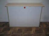 Portable bar with rear storage area