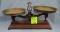 Antique cast iron scale with dual brass bins