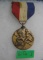 One mile relay runner's award medal and ribbon