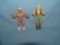 Pair of vintage sport figures