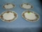 Group of 4 holiday decorated serving plates