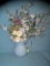 Porcelain pitcher with artificial flower display