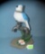 Modern bird and faucet figurine