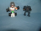 Pair of vintage transformer toys