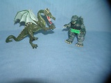 Pair of vintage Godzilla and dragon figures