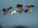 Group of vintage toy cars, trucks and parts