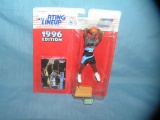 Tyrone Hill basketball figure and sports card