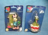 Pair of early Disney figural character candles