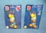 Pair of early Disney figural character candles