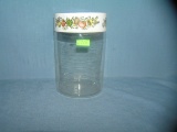 Vintage vegetable decorated glass container