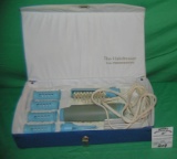 Vintage hair dressing kit by Remington Co