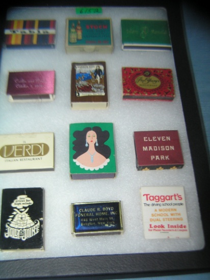 Collection of vintage match boxes and books