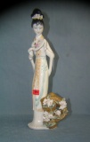 Porcelain hand painted Geisha girl figurine