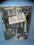 Jail Keys Made Here and other advertising signs