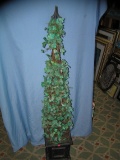 5 foot metal framed artificial tree in planter pot