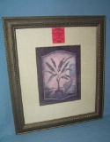 Matted and framed palm tree print