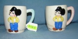 Pair of great early Mickey Mouse milk mugs