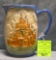 Early castle decorated glazed over art pottery pitcher