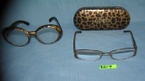Guess eyeware with a case and a another pair of glasses