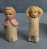 Pair of miniature porcelain dolls