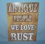 Antique people we love rust retro style advertising sign