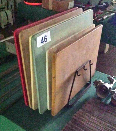 LOT OF (6) CUTTING BOARDS & RACK
