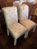 (2) UPHOLSTERED PARSONS CHAIRS - WHITE W/ INSECT PATTERN