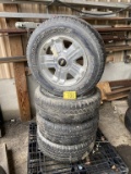 (4) BRIDGESTONE DUELER P265/65R18 TURES ON ALUMINUM RIMS