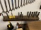 LOT OF END MILLS IN HOLDER ON WALL