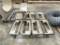 (4) 2’ X 2’ STEEL 4-WHEELED DOLLIES. SELLING BY THE PIECE