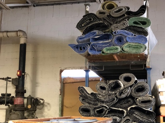 LOT: 87-ROLLS ROLLS CARPET, LINOLEUM ON (5) PORTABLE STACK RACKS & FLOOR, COLORS: TEAL, WOOD PLANK