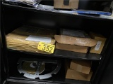 CABINET CONTENTS (BOTTOM 2 SHELVES); ASSORTED MOVIE TAPE REELS