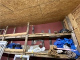 REMAINING CONTENTS ON BACK WALL SHELVING: LUMBER TARPS, BLUE TARPS, WOODEN SLAT BUNDLES, INSULATION