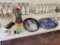 ASSORTED COKE COLLECTIBLES; BOTTLES, GUMBALL MACHINE, BOTTLE OPENER, PEN, SERVING TRAYS