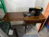 SINGER SEWING MACHINE & TABLE, 23.5