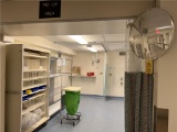 FLR 2: CONTENTS OF PRE-OP AREA: 4-SHELF WIRE RACK, PORTABLE ENCLOSED 9-SHELF CABINET W/ DIVIDERS,