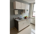 FLR 5: CONTENTS OF 10-EXAM ROOMS: ADA SAFETY HAND RAILS, WORK COUNTERS, ASSORTED CABINETRY,
