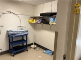 FLR 2: CONTENTS OF EQUIPMENT STORAGE ROOM: EXAM LIGHT, RUBBERMAID BUS CART & MISC.