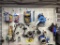 MISCELLANEOUS LOT ON PEG BOARD ON WALL