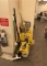 LOT: MOP BUCKET, (2) MOPS, (7) WET FLOOR SIGNS