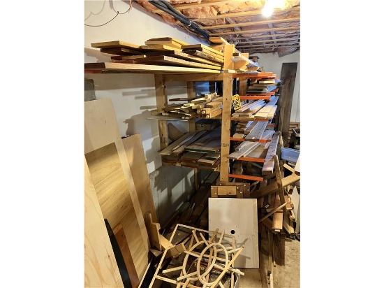 LOT OF ASSORTED LUMBER IN RACK & ALONG WALL