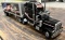 FRANKLIN MINT BLACK PETERBILT 379 TRACTOR WITH REEFER TRAILER, 1:32 SCALE