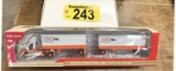FIRST GEAR INTERNATIONAL 8600 TNT PILOT TRACTOR WITH 2-PUP TRAILERS, 1:64 SCALE