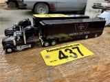 BLACK/PURPLE WESTERN STAR TRACTOR WITH TRANSPORT TRAILER
