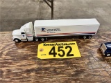 WHITE INTERNATIONAL UNITED STATES POSTAL SERVICE TRACTOR TRAILER, 1:64 SCALE