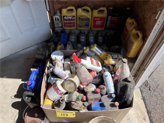 LOT OF ASSORTED LUBRICANTS, OILS, ANTIFREEZE IN CORNER