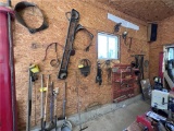 LOT OF ASSORTED AUTO PARTS ON WALL
