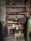 CONTENTS ON 5-SHELVES: THREADED ROD, STEEL STOCK, GALVANIZED NAILS, AMMUNITION BOXES