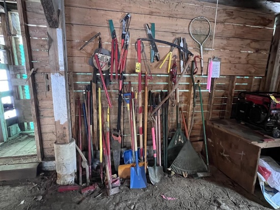 LONG HANDLED TOOL LOT: SHOVELS, RAKES, PRY BARS, AXES, POLE SAW, MISC.